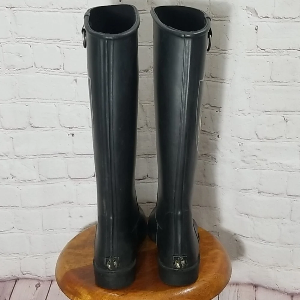 Juicy Couture Black Crest Rubber Tassel Riding Boots